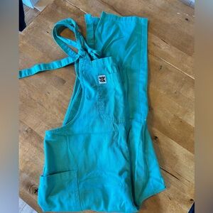 Bright turquoise Lucy and Yak 100% organic cotton dungarees